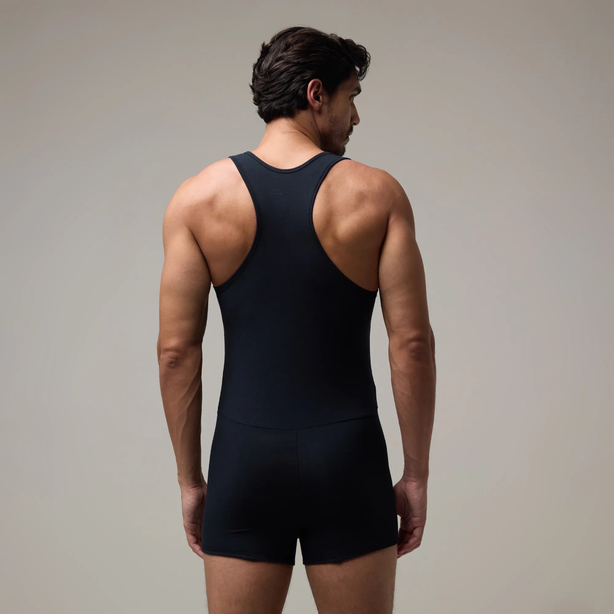 Black T1X Trunk-Cut Bodysuit for Men – Stretchable, Comfortable Innerwear by Soma. Carbon