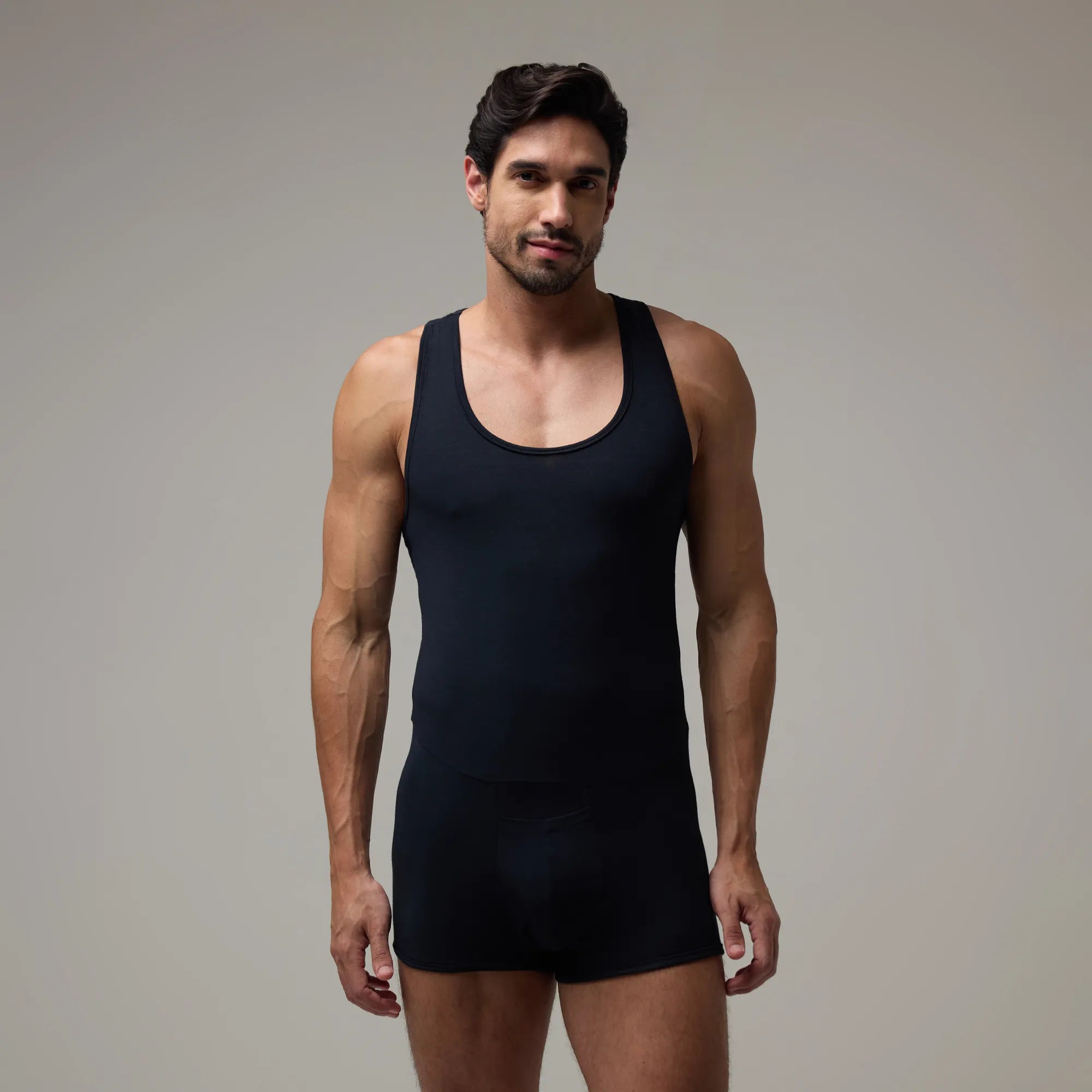Black T1X Trunk-Cut Bodysuit for Men – Stretchable, Comfortable Innerwear by Soma. Carbon