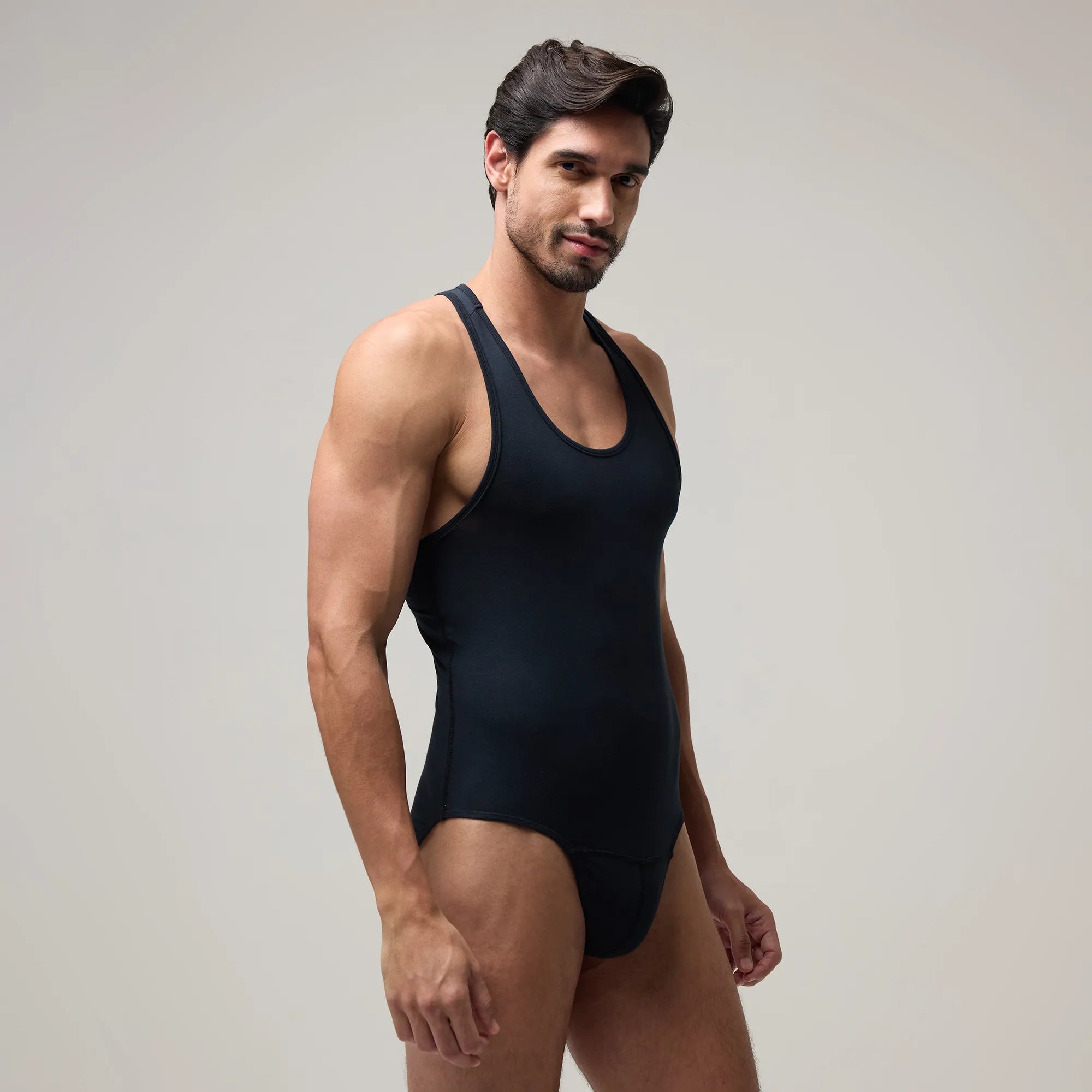 Front view of Men’s Brief-Cut Bodysuit Top – Briefline B1 in Black, soma.xy premium innerwear. Carbon